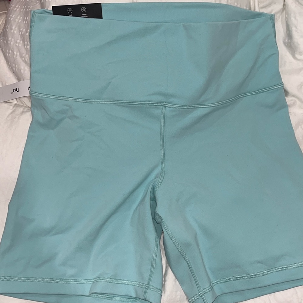 NWT TNA biker shorts Aritzia